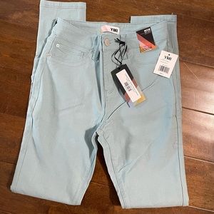 YMI size large mid-rise skinny jeggings.